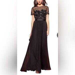 Woman’s black Sheer Illusion Neck Embellished Long Dress